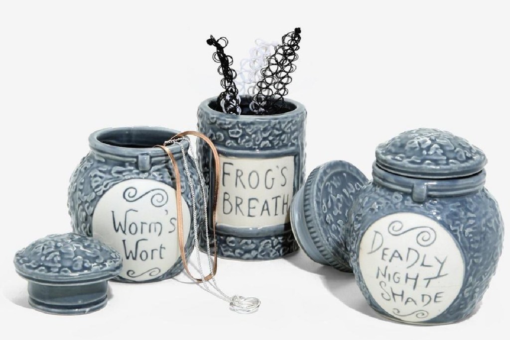 The Nightmare Before Christmas Trinket Jar Set with jewelry sticking out of it