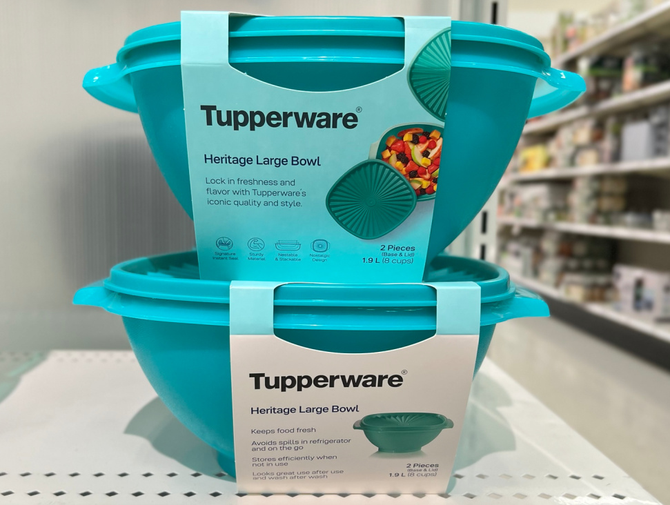 two Tupperware Heritage Large Bowl - Parrotfish stacked on top of each other