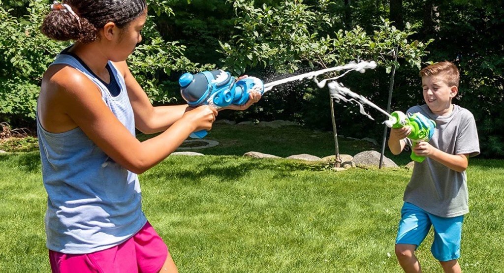 Two kids plating with the Foam Blaster