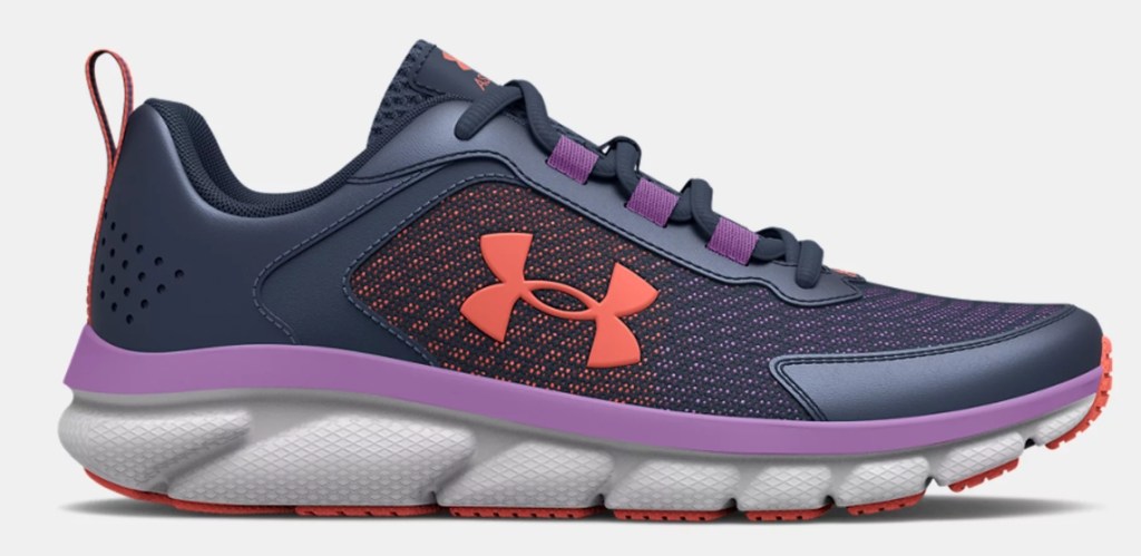 blue, purple, pink and grey Under Armour running shoe