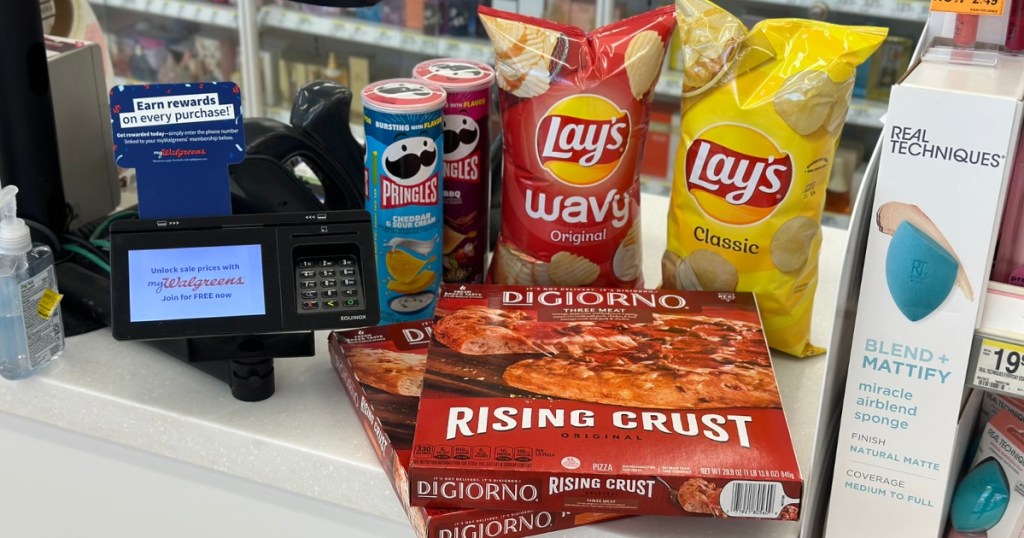 walgreens chips and frozen pizza on store counter