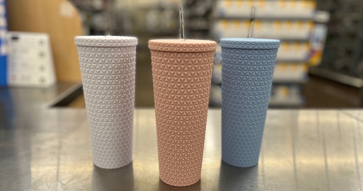 three Walmart soft touch textured plastic tumblers in white pink and blue