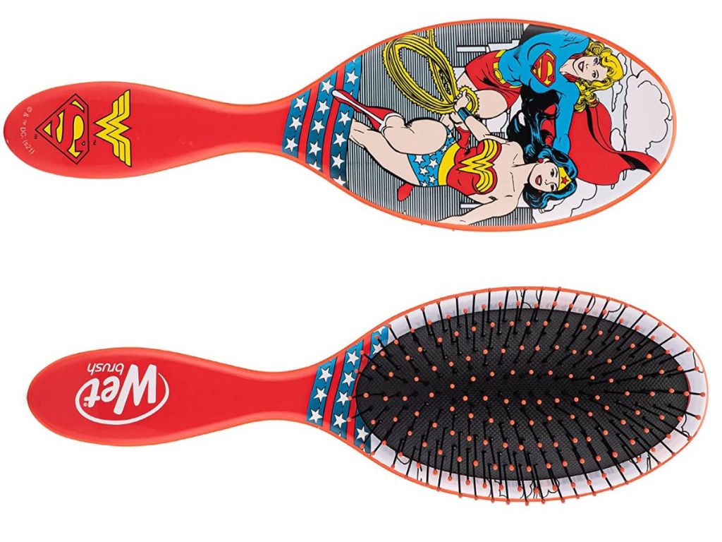Hairbrush with pictures of Wonder Woman and Super Girl