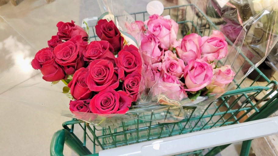 two dozen roses in cart in store