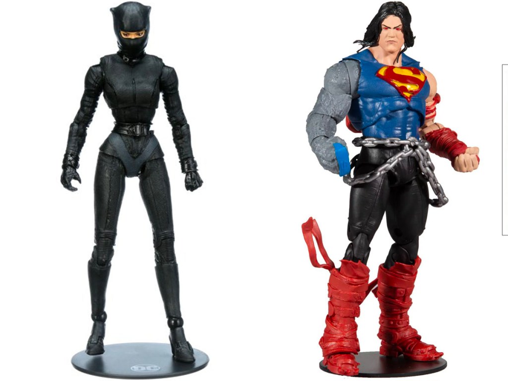 cat woman and superman action figure stock images
