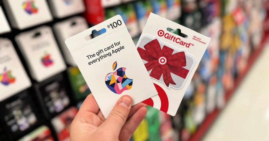 man holding apple and target gift cards