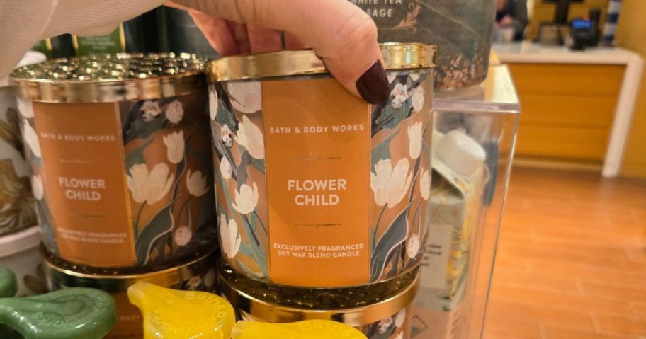 bath and body works flower child 3-Wick Candle in hand in store