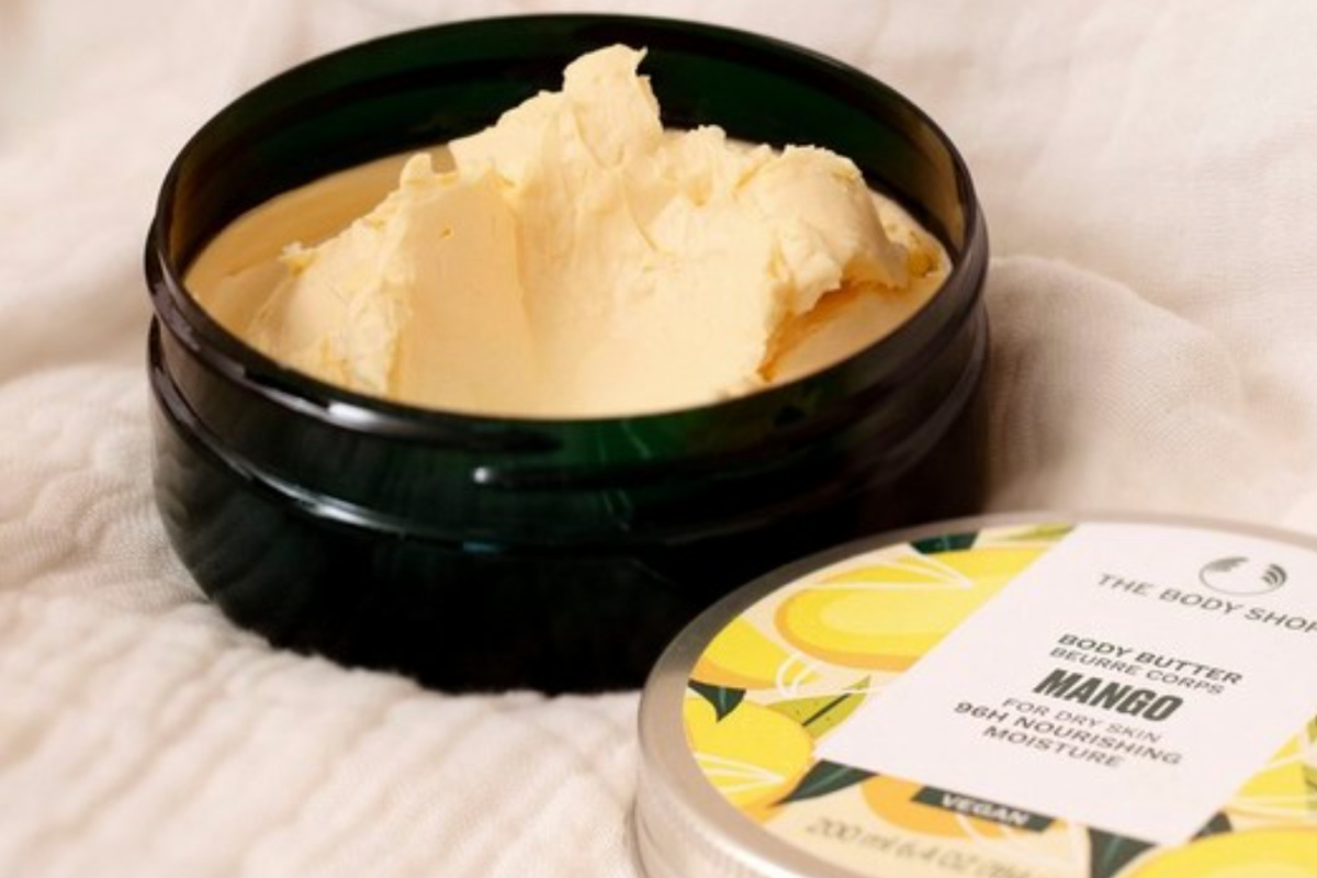 opened container of body butter