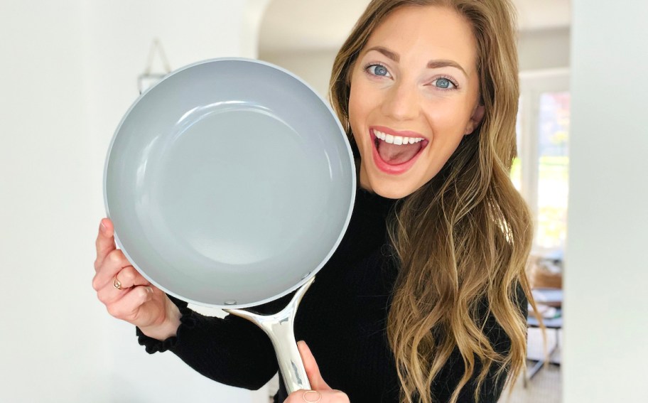 woman holding nonstick pan