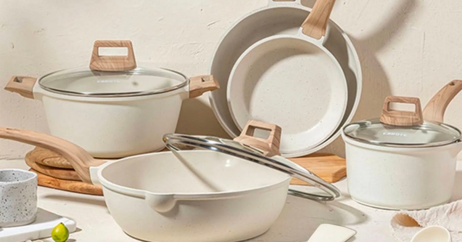 carote white granite pots and pans set on kitchen counter