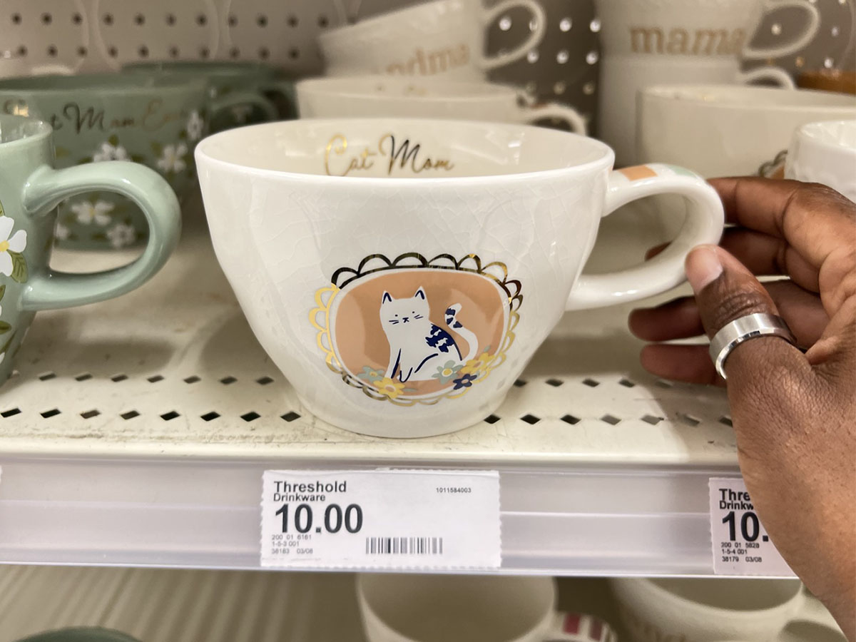 white cat mom mug on shelf