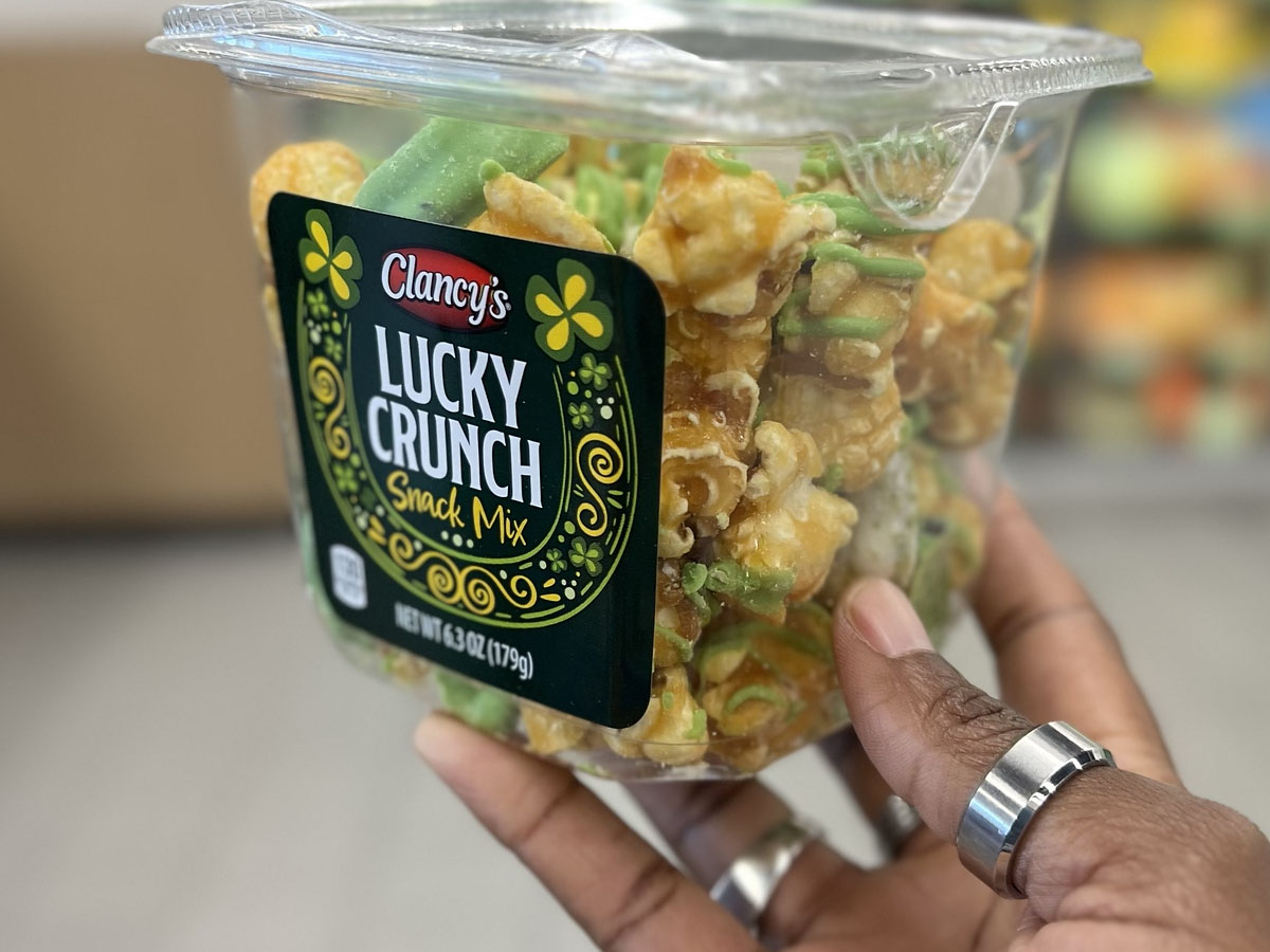 hand holding clancys lucky crunch snack mix