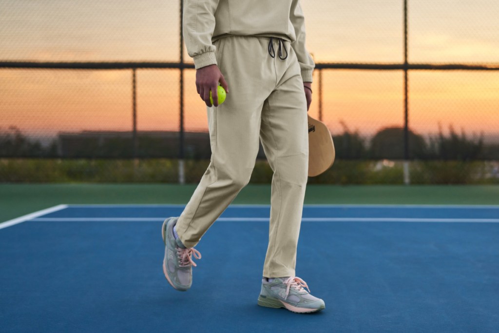 man wearing neutral sweatpants outside