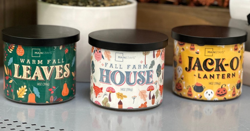 3 fall mainstays candles on shelf in walmart store