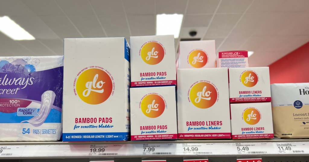 packages of glo bamboo pads and liners on a target store shelf