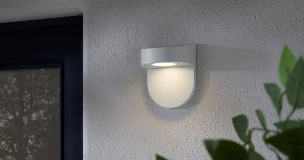 white light sconce on wall