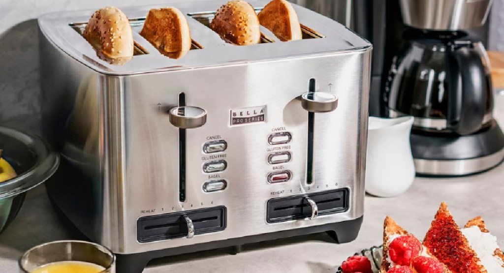 image of 4 slice toaster in kitchen surrounded by food