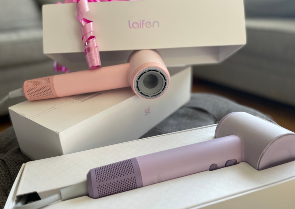 Pink and Purple Laifen hair dryers with boxes