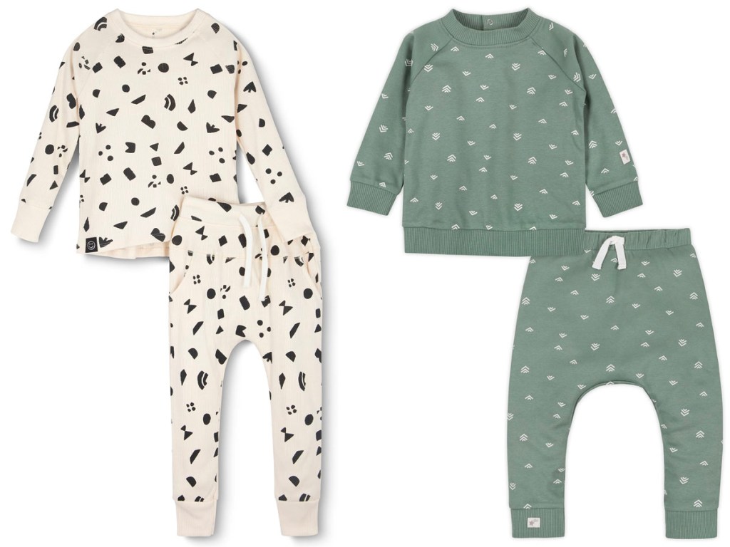 2 little star organics baby outfit stock images