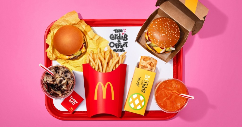 McDonald's meal on tray with a pink background