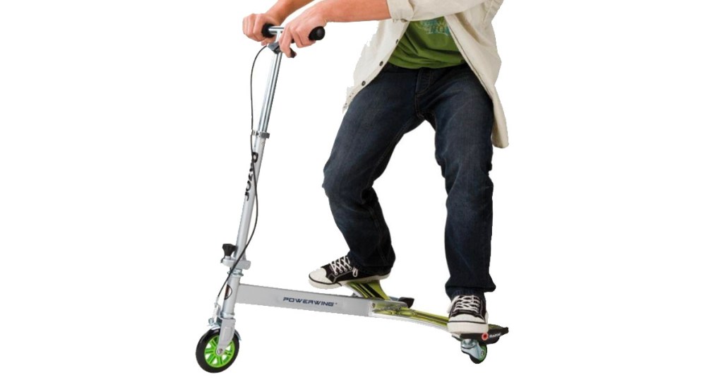 teen riding razor powerwing scooter