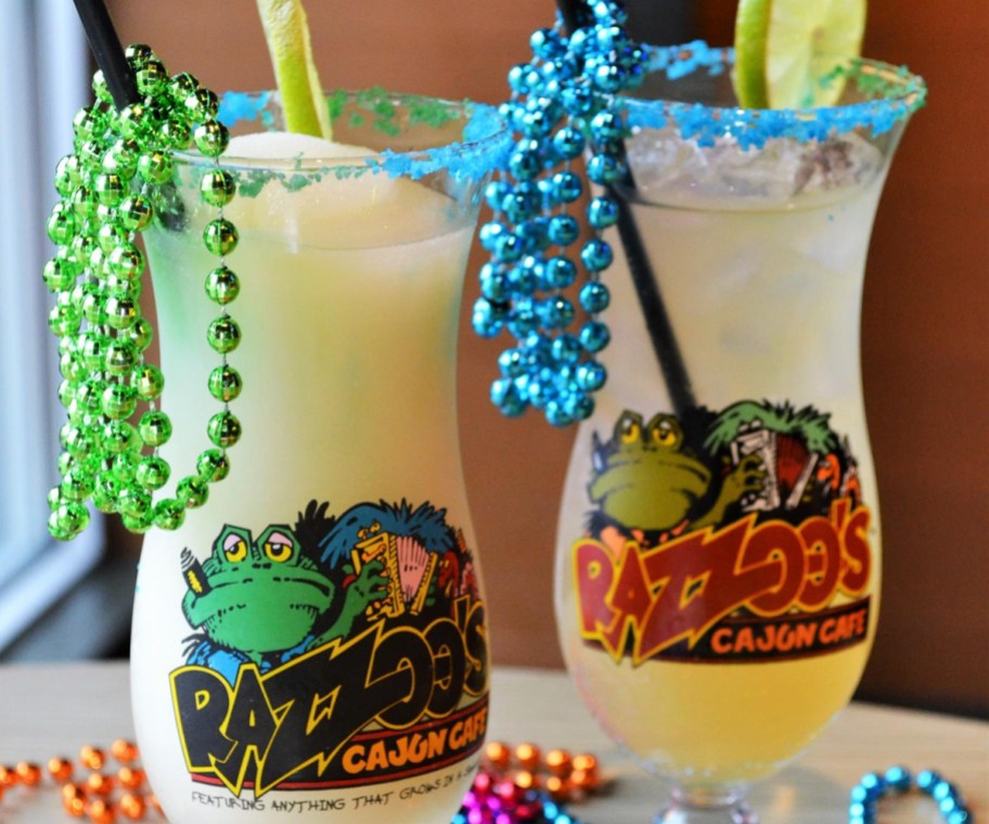 two margaritas in glasses decorated with beads