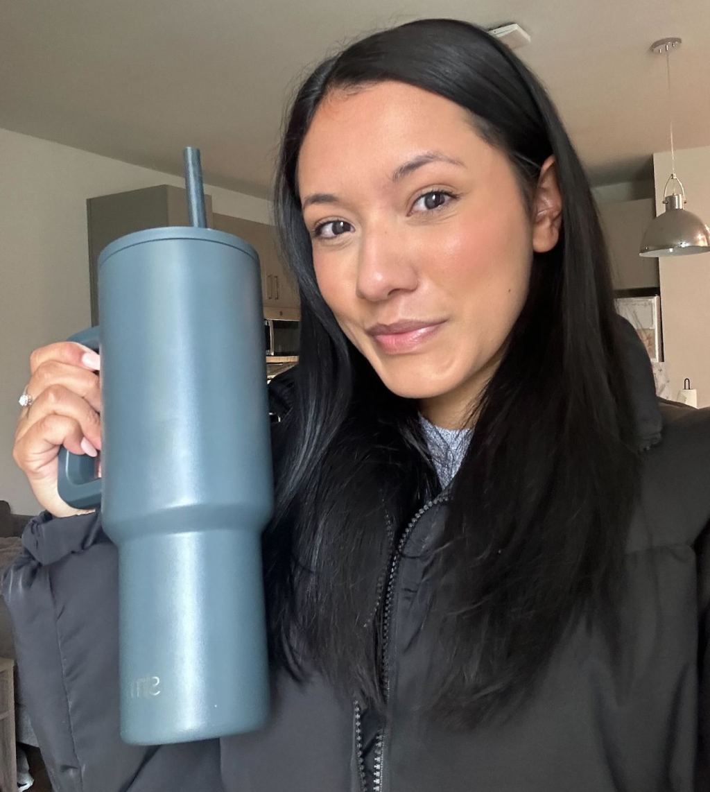 woman holding blue simple modern tumbler