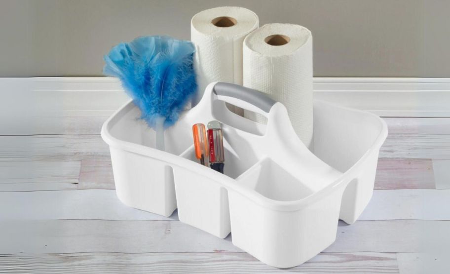 sterilite cleaning caddy loaded with paper towels, feather duster, and cleaning sponges