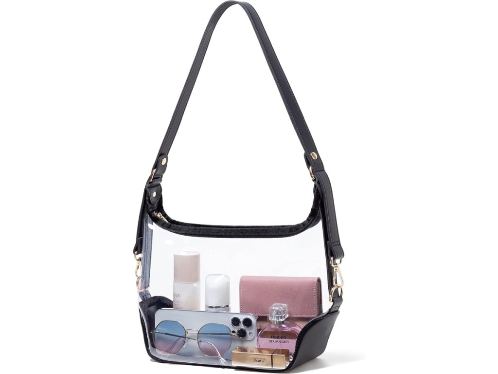 stock image of Vorspack Clear purse with sunglasses. perfume and lipstick