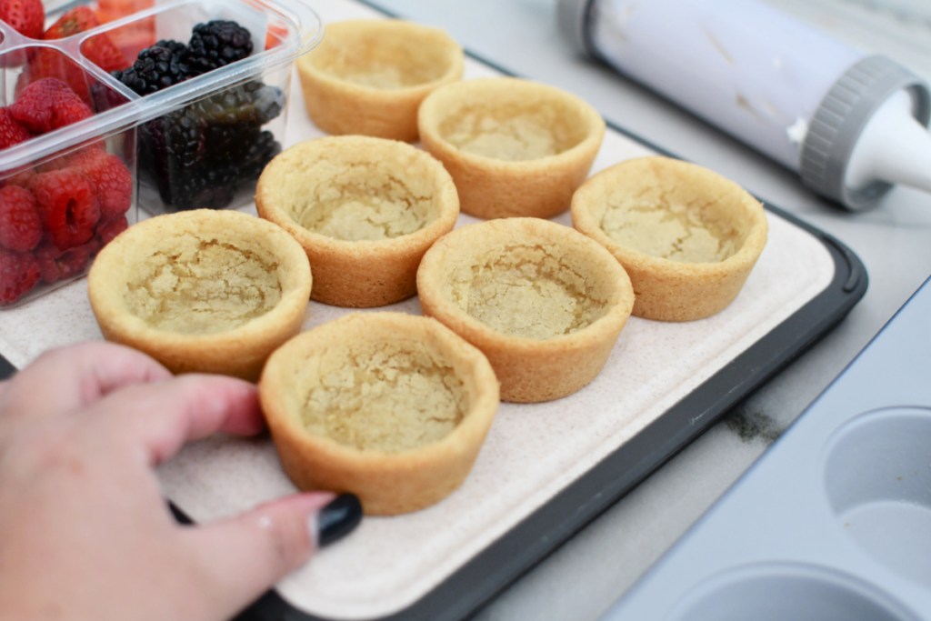 Baking sugar cookie cups using store-bought dough. 