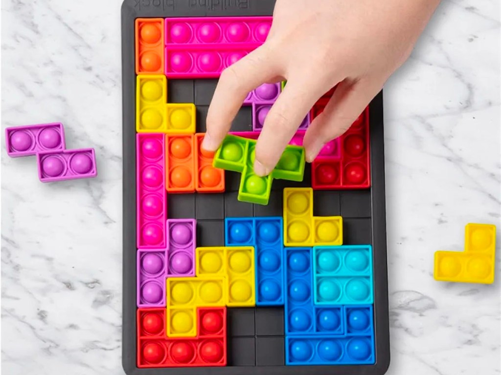 hand on tetris push pop toy