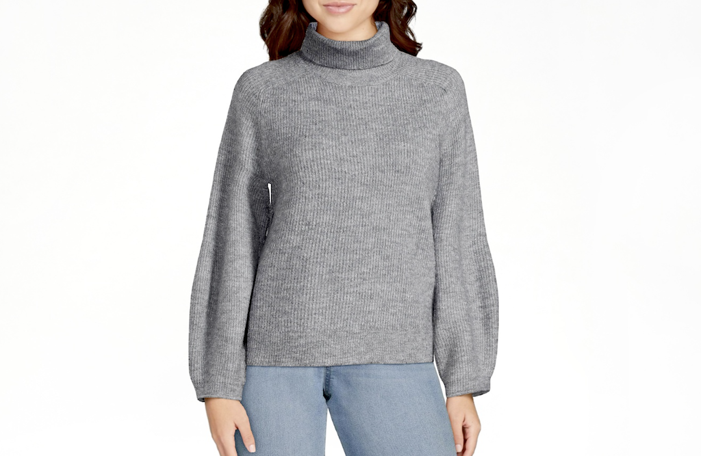 woman wearing grey Walmart sweater 