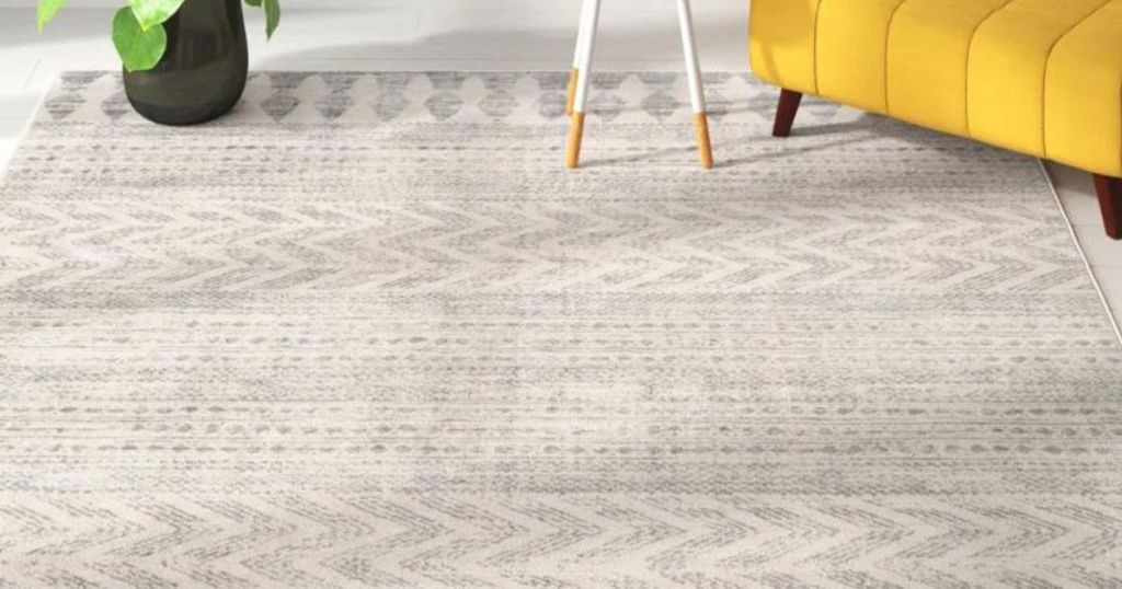 off white gray patterned rug on living room floor