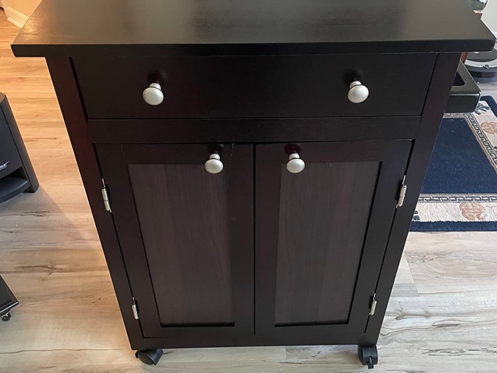black rolling kitchen cart with silver knobs