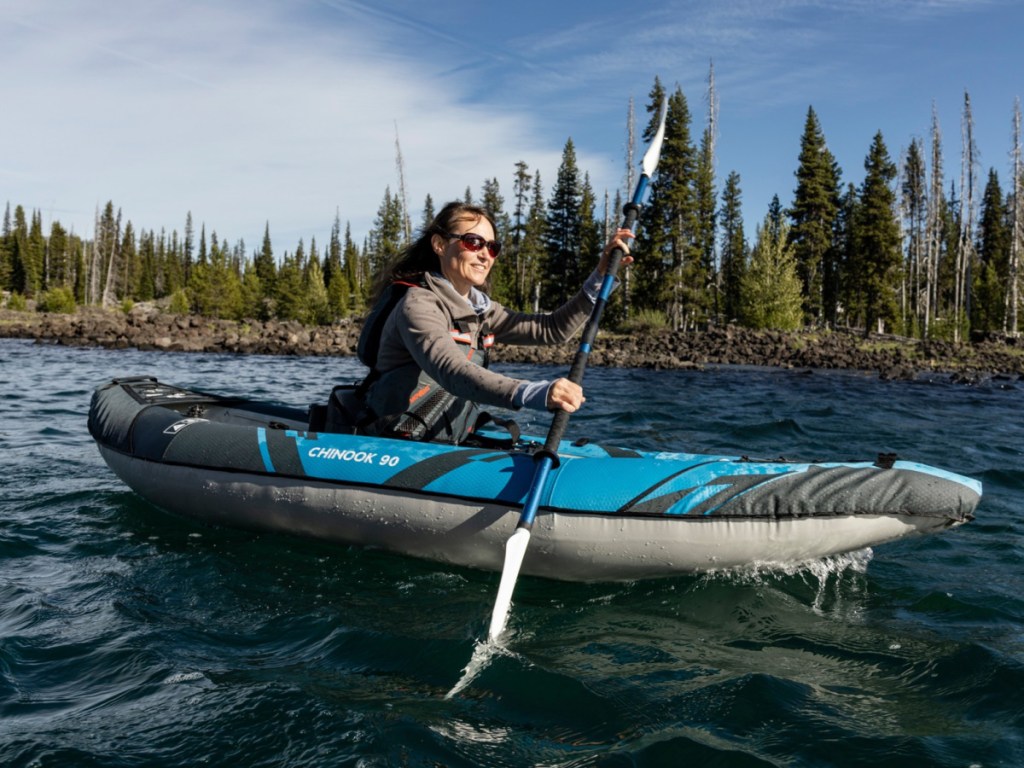 woman on Aquaglide Chinook 90 Inflatable Kayak in the ocean