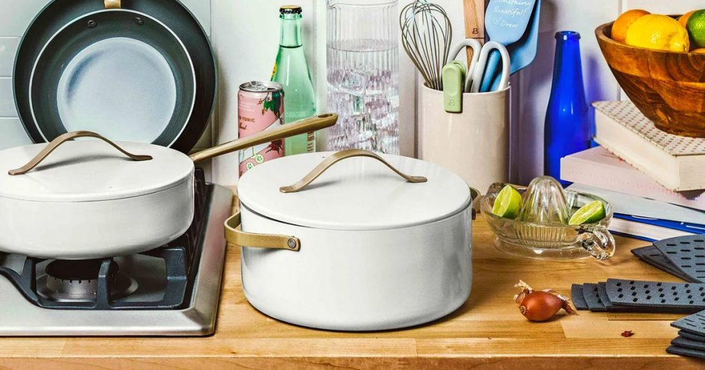 Beautiful by Drew Barrymore Cookware Pieces being displayed on a kitchen counter