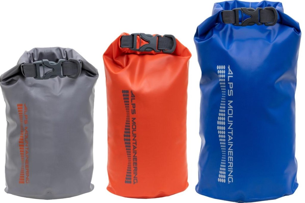 A grey, red, and a blue dry bag