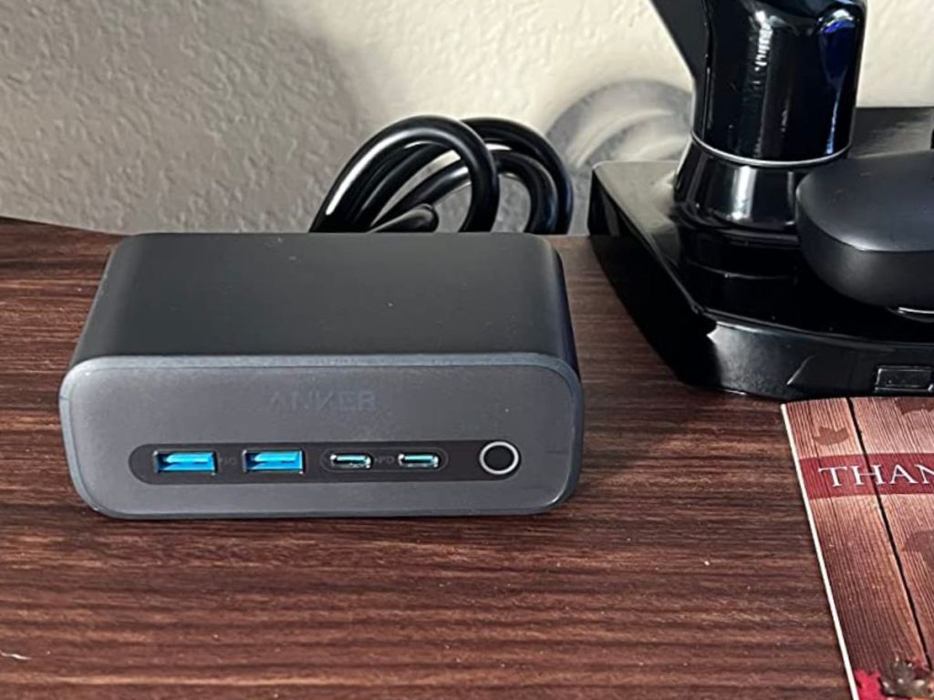 Anker Charging Station next to a lamp on a desk