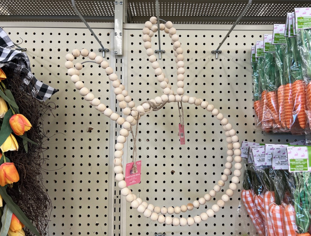 beaded bunny wreath on store display wall