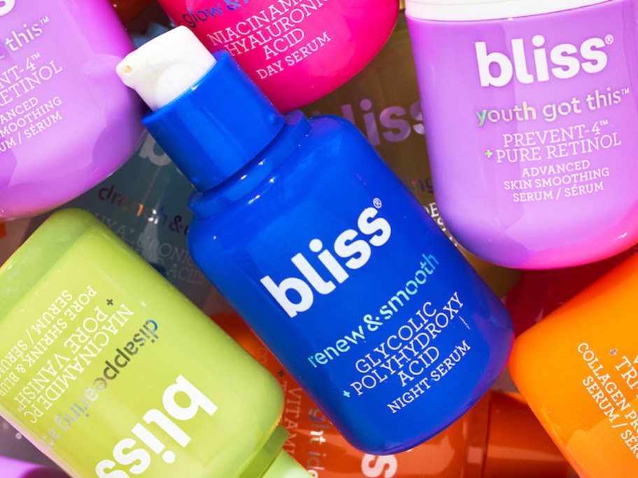colorful pile of bottles of Bliss serums