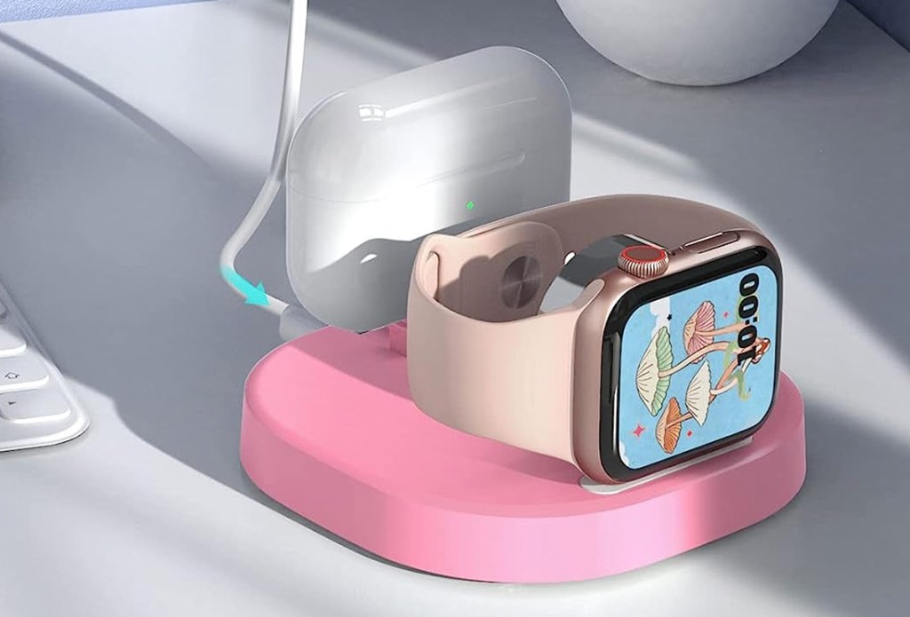 apple watch on pink charging stand