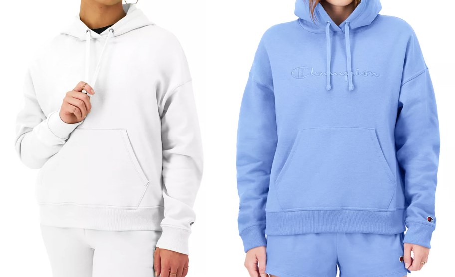 two women in white and blue champion hoodies