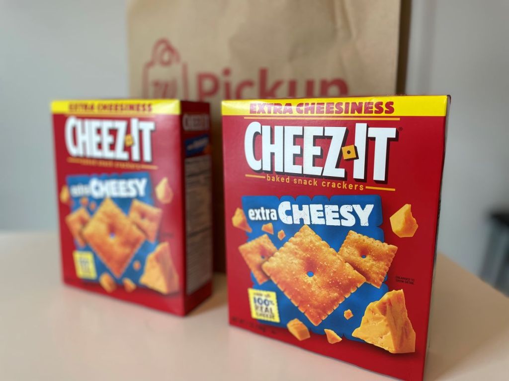 Two boxes of Cheez-it Crackers next to a Walgreens bag