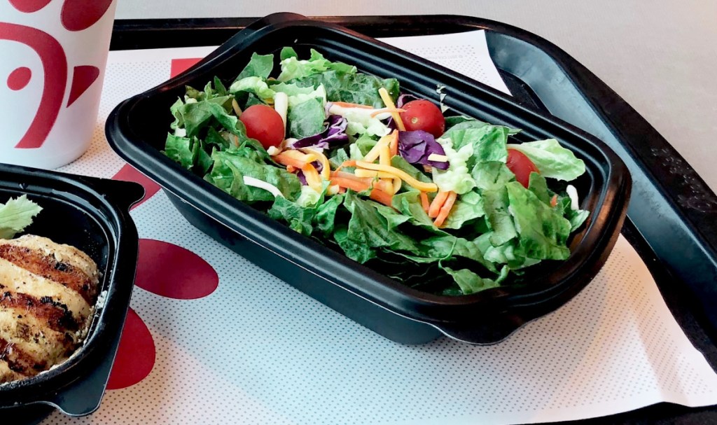 A chick-fil-a side salad on a dining tray