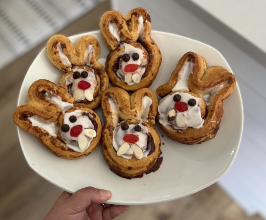 A plate of cinnamon roll bunnies Easter breakfast recipe