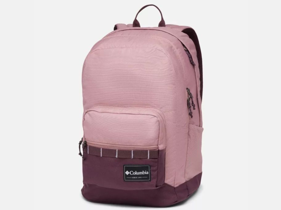 pink columbia backpack with a gray background