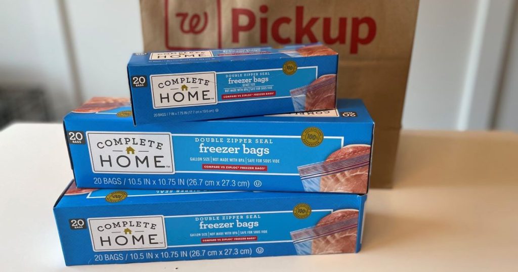 Three boxes of Complete Home Storage Bags next to a Walgreens bag