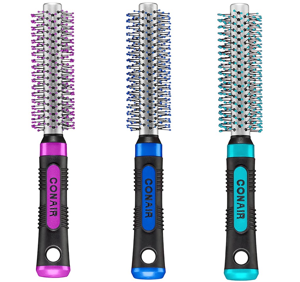 three round metal hair brushes