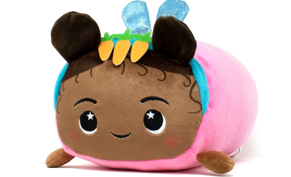 Plush toy that looks like a girl wearing Easter bunny ears