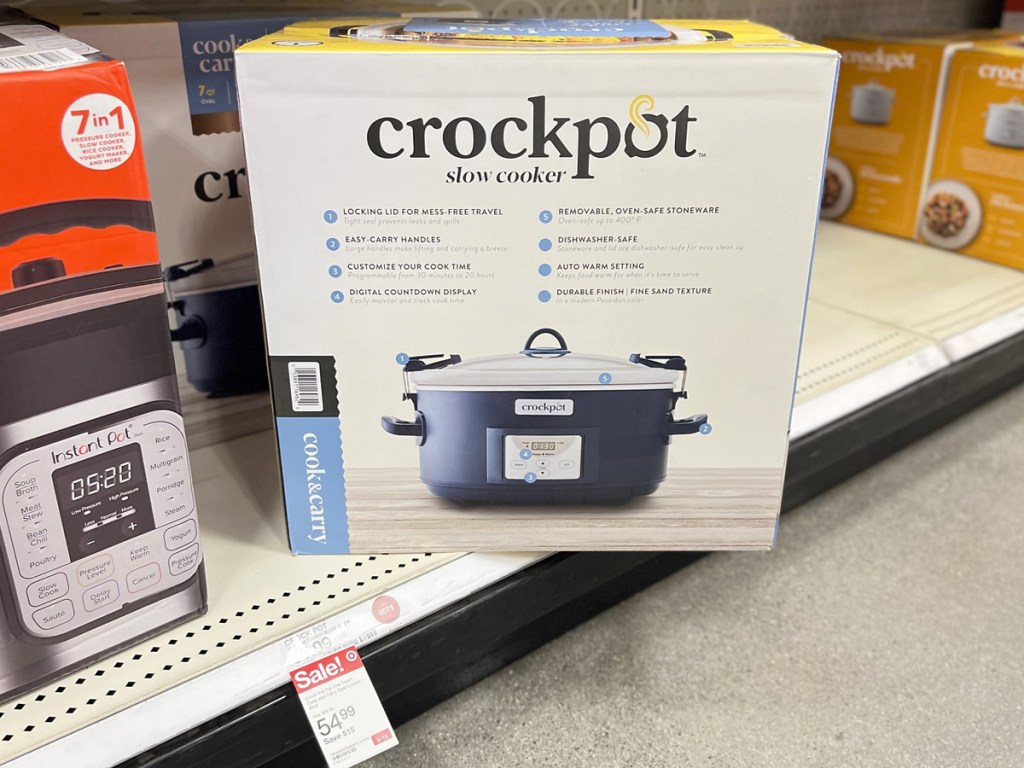 blue crockpot in box on shelf at target